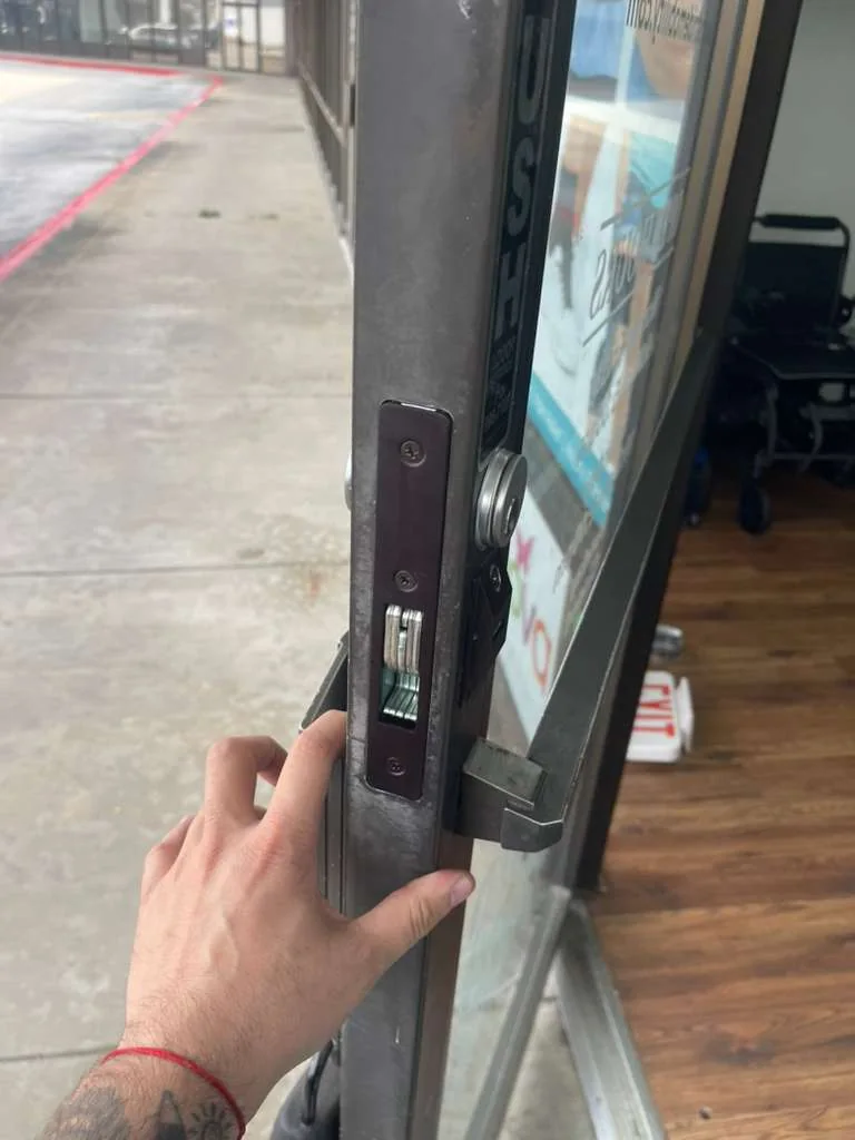 Front door latch hardware during an entry security review
