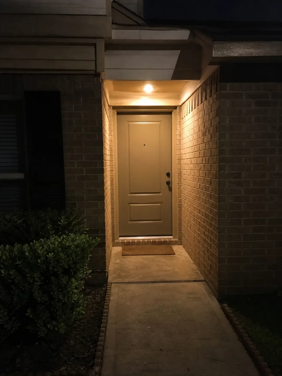 Houston home entrance photographed at night